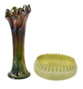 A Stourbridge citrus-yellow shallow bowl and a Carnival glass vase, last quarter 19th century, the