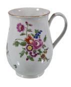 A Worcester polychrome bell-shaped mug, circa 1770, painted with flowers, paper label for the H.