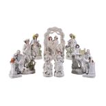 An assortment of Staffordshire figures and groups, mid 19th century, including Shakespeare and