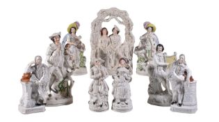 An assortment of Staffordshire figures and groups, mid 19th century, including Shakespeare and