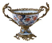 A Japanese Imari gilt-metal mounted two-handled bowl, in the Louis XV style, the mounts 19th