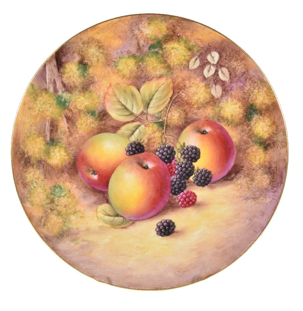 A Royal Worcester plate painted by J.Smith, typically decorated with fallen autumnal fruit within