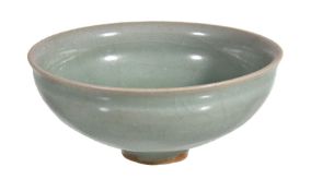 A Chinese celadon small bowl, with some natural craquelure to the glaze,11.3cm diameter