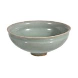 A Chinese celadon small bowl, with some natural craquelure to the glaze,11.3cm diameter