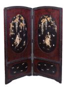 Y A Japanese Two-Fold Screen, each leaf set with lacquer panels within asa-no-ha and diaper designs,