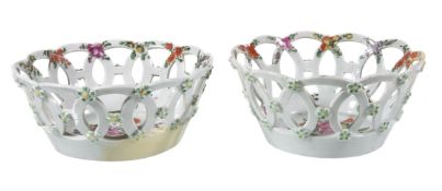 A pair of Worcester pierced polychrome baskets, circa 1760, painted with flowers, paper label for H.