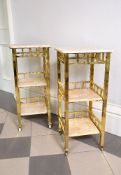 A companion pair of gilt brass and alabaster mounted three tier étagères, 20th century, each of