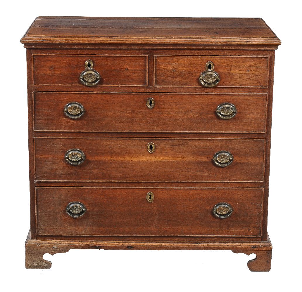 A George III oak chest of drawers, circa 1780, with two short and three long graduated drawers, on