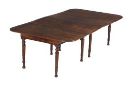 A George IV mahogany dining table, with two additional leaf insertions, circa 1825, 74cm high