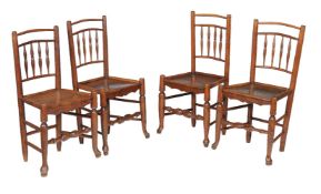 A harlequin set of four elm side chairs, early 19th century, each with spindle back and solid seat