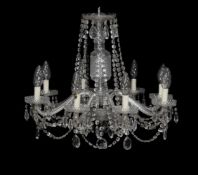 A Continental moulded and cut glass eight light chandelier, second half 20th century, the electrical