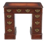A mahogany kneehole writing desk, late 19th century, of small proportion, 75cm high, 82cm wide, 49cm
