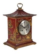 A red lacquered bracket clock, probably HAC, circa 1920, with German gong striking movement, the