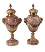 A pair of striated rouge and white marble urns in Neoclassical taste, second half 20th century, each