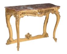 A carved giltwood and marble mounted console table, in Louis XV style, late 19th/early 20th century,