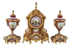 A gilt spelter and porcelain clock garniture, Japy Freres, early 20th century, the eight-day bell