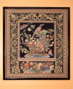 A framed woven tapestry panel, probably following the design of pietra dure table top, depicting a