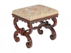 Y A Victorian rosewood and tapestry upholstered stool, circa 1850, with scrolled X-frame supports