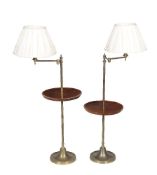 A pair of mahogany and brass standard lamp tables, 20th century, each light fitting on angle