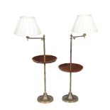 A pair of mahogany and brass standard lamp tables, 20th century, each light fitting on angle