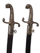 Two Victorian bandsman's swords, mid 19th century, the blades marked S. ISAACS, CAMPBELL & Co. 21