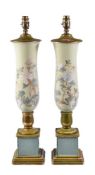 A pair of reverse painted glass vases giltwood mounted as table lamps, 20th century, of slender