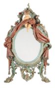 A North European carved wood and polychrome painted wall mirror, early 20th century, 155cm high,