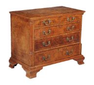 A George III walnut and chevron banded chest of drawers, circa 1770, probably Northern England, with