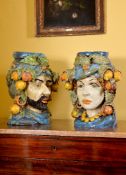 A pair of modern Sicilian Maiolica style figural head jars or planters, modelled wearing turbans,