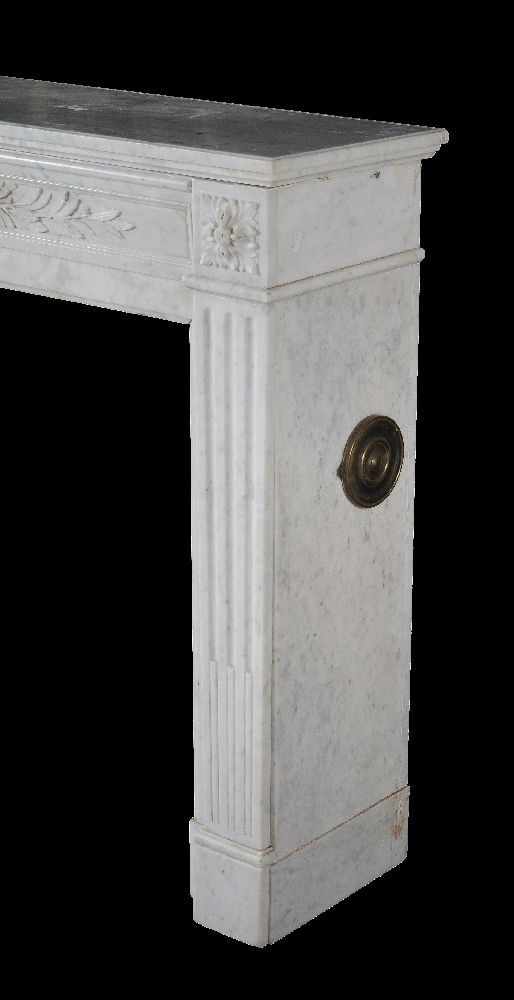 A mottled white marble chimneypiece in Louis XVI style, 19th century, the frieze of crossed laurel - Image 4 of 4