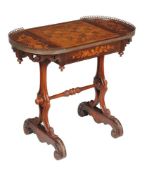 A Victorian walnut, specimen marquetry and gilt metal mounted games table, circa 1860, the top
