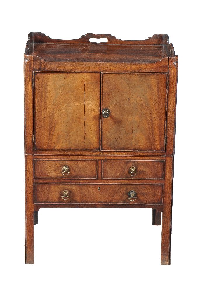 A George III mahogany tray top commode, circa 1780, with false drawer fronts to the slide now