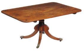A George IV mahogany and ebony inlaid breakfast table, circa 1825, in the manner of George