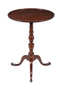 A George III mahogany tripod table, circa 1770, the dished circular top with a moulded edge, 70cm
