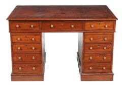A Victorian mahogany partners pedestal desk, by R. LOADER, LONDON, circa 1880, the gilt tooled red