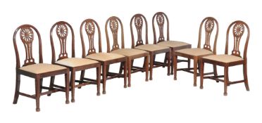 A set of eight mahogany dining chairs in George III style, 20th century, after the manner of
