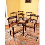 A set of six mahogany dining chairs, circa 1840, probably Colonial, to include two armchairs, each
