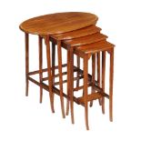 Y A nest of mahogany and rosewood banded quartetto tables, early 20th century, the largest oval