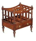 Y A Regency rosewood Canterbury, circa 1815, the swept top with central carry handle above the