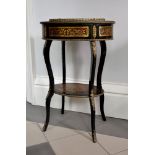 Y A Napoleon III red tortoise shell and brass marquetry inlaid jardinière table, circa 1870, of oval