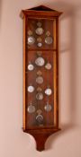 A mahogany and birch key cabinet, 20th century, formally a regulator wall clock case, of