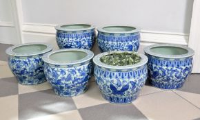 Three pairs of similar modern Chinese celadon ground and blue decorated goldfish bowls or