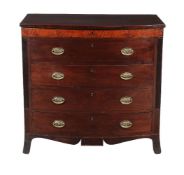 A Regency mahogany and string inlaid chest of drawers, circa 1815, the lift top enclosing