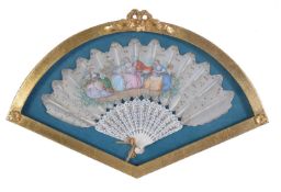 A French bone and painted fan, decorated with courtiers in an exterior scene in 18th century