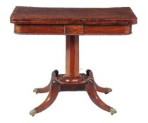 Y A George IV mahogany and rosewood banded card table, circa 1830, with faceted pillar and quadruple