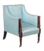 A Regency mahogany and upholstered library armchair, circa 1820, with turned pillars to the arms