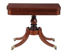 Y A George IV mahogany and rosewood inlaid card table, circa 1825, with turned pillar and