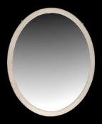 A Victorian oval wall mirror, late 19th century and later white painted, 136cm x 111cm