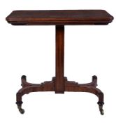 A Regency mahogany reading stand, circa 1815, the hinged top above a height adjustable square