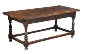 An oak refectory table in Charles II style, containing some 17th century elements, 76cm high, 82cm